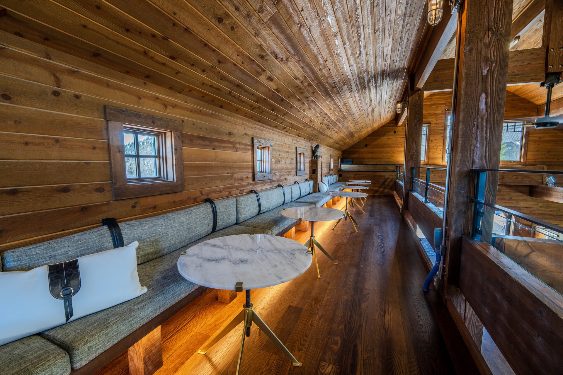 Upper level bench seating and bistro tables
