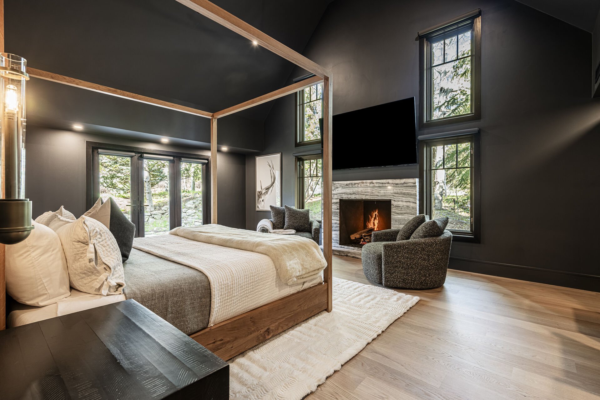 Sun Peak Manor House - Primary Suite with a king bed and vaulted ceiling
