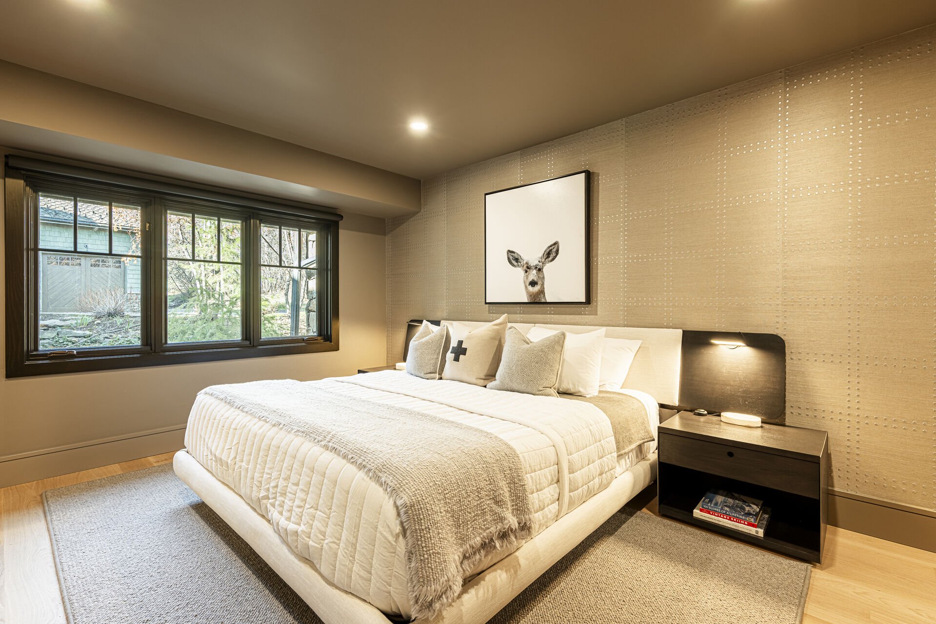 Sun Peak Manor House - Main Level Guest Bedroom 2 with a king bed and Smart TV