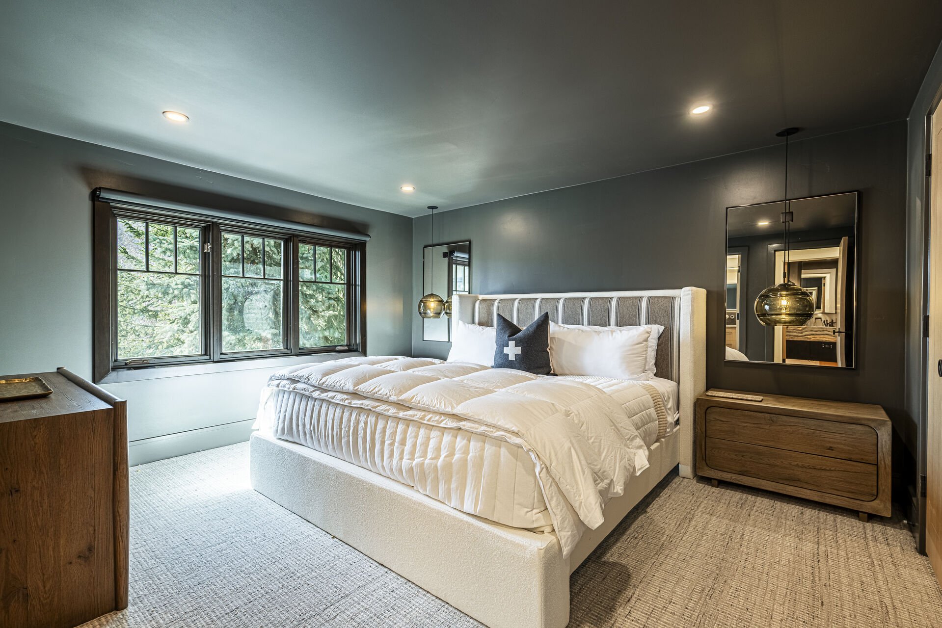 Sun Peak Manor House - Main Level Guest Bedroom 3 with a plush king bed