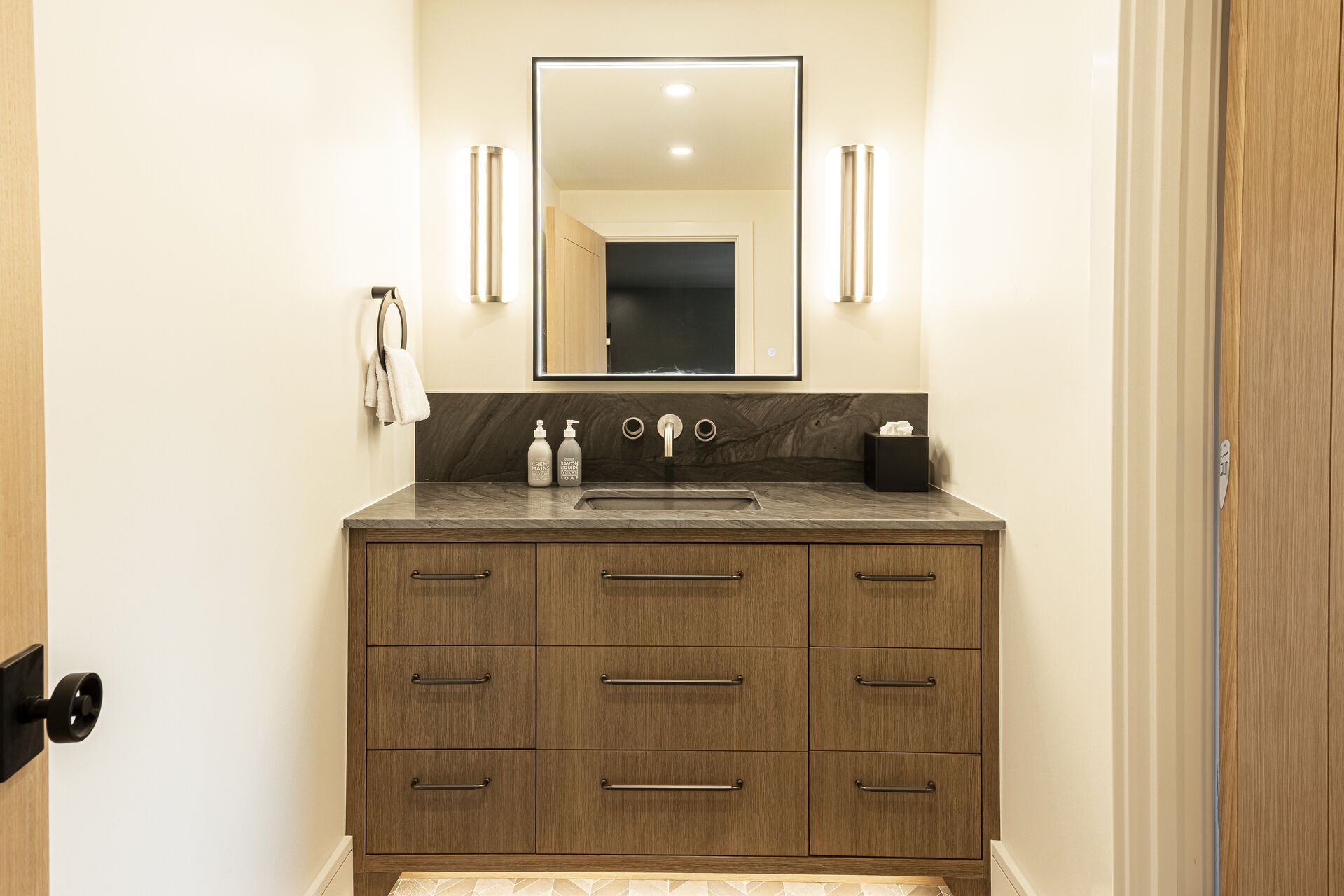 Sun Peak Manor House - Guest Bedroom 3 en suite vanity lighted mirror